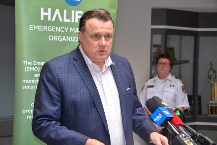 Mike Savage, mayor of Halifax Regional Municipality, outlines measures taken by the city to curb the COVID-19 threat at a news conference held Monday afternoon at a municipal building in Dartmouth that houses the Emergency Management Office.