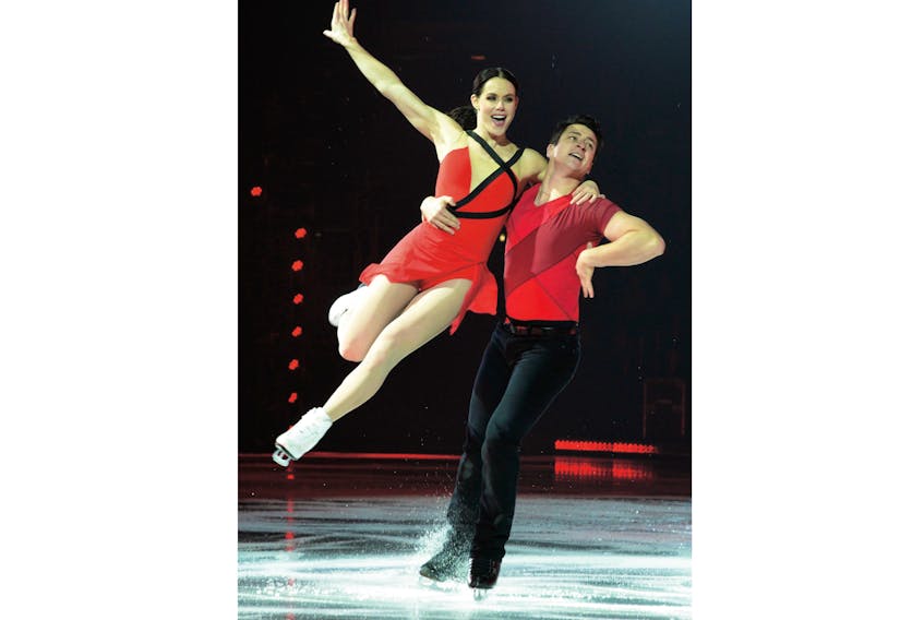 Tessa Virtue and Scott Moir perform Saturday night at Mile One Centre in St. John’s, the final stop of the cross-country Rock The Rink figure skating tour. — Keith Gosse