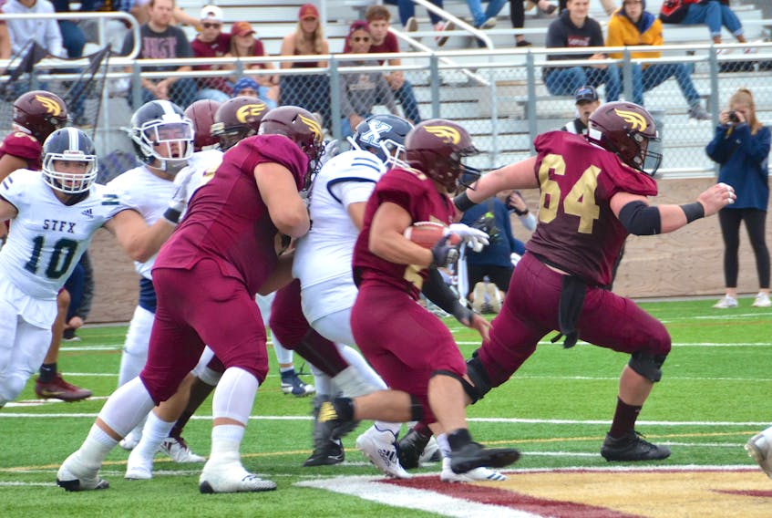 Former Titan Jack Estabrooks, shown running the ball earlier this season, has emerged as a team leader in the Mounties’ quest for a spot in 2019 AUS playoffs.