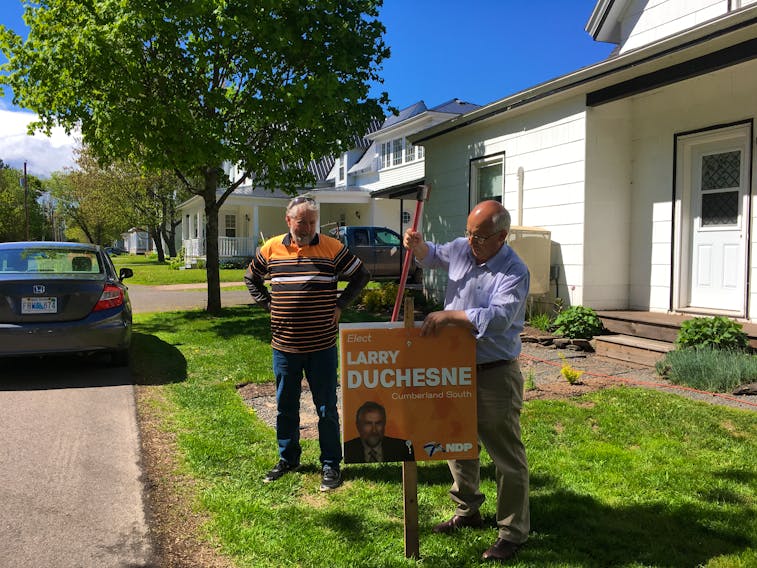 Nova Scotia NDP leader Gary Burrill (right) campaigned with Cumberland South NDP candidate Larry Duchesne in Oxford on Tuesday.