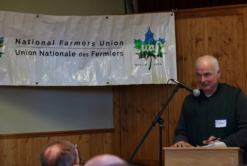 National Farmers Union district director Doug Campbell addresses members at the NFU convention on Tuesday. Campbell pledged to bring issues of land concentration on P.E.I. to the fore in the coming election. Stu Neatby/The Guardian