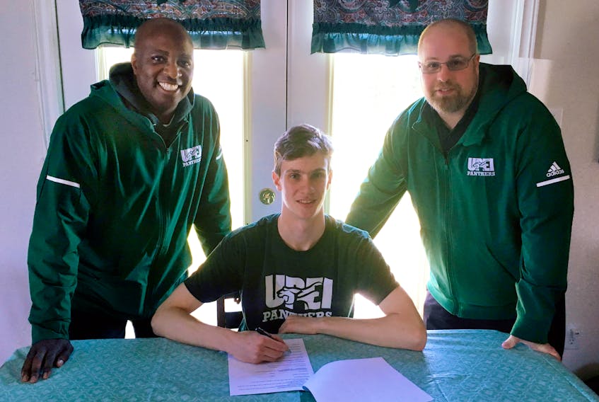 Scotsburn’s Glen Cox recently signed with the UPEI Panthers basketball program, coached by Darrell Glenn, left, and assistant coach Patrick Harvard.