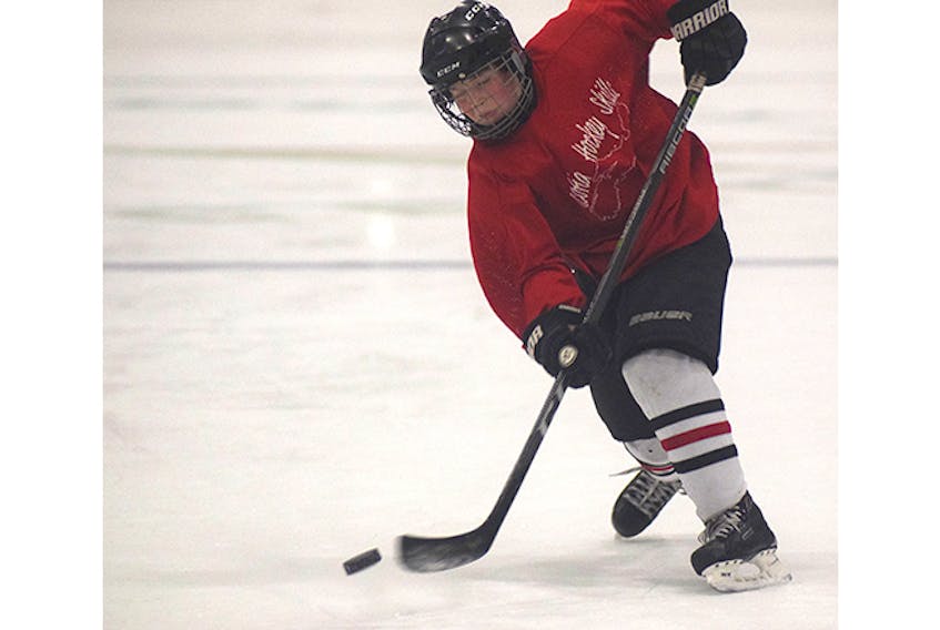 Dominic MacKenzie of the Peewee AAA Crushers lets loose with a shot during the session. The event was organized by the Pictou County Minor Hockey Association.