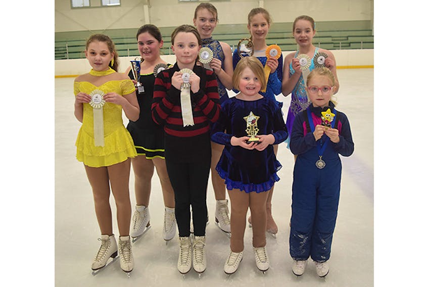 In front from left are: Jessica Arnold, Ella MacIntyre, Lexi Smith and Kenzie Benoit. In back are Makayla McGee, Adelle Thomsen, Lauren Hanna and Ariel Ferris.