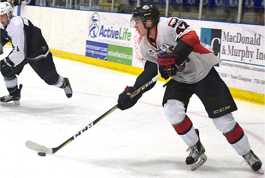 Michael Dill, shown in a December game, has moved into the top spot among Crushers point-getters.