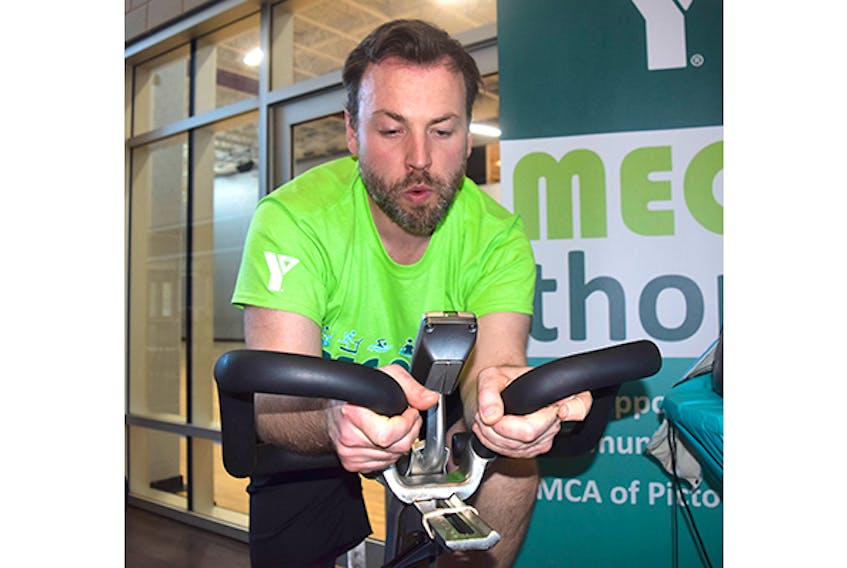 Jim Pomeroy rides the stationary bike at the YMCA of Pictou County.
