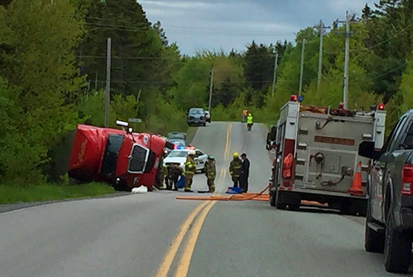 Caribou fire department were called to a scene around 10:30 a.m. on Saturday when a tractor trailer overturned leaving the driveway of North Nova Seafoods fish plant.