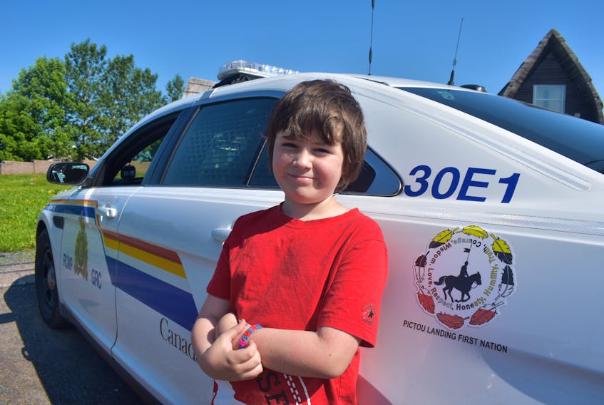 Ten year-old Kaden Mills of Pictou Landing First Nation recently had his art-work chosen for Pictou Regional RCMP cruiser.