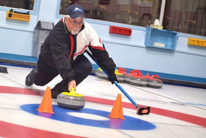 Jim Nix practices at the Bluenose Curling Club last month.