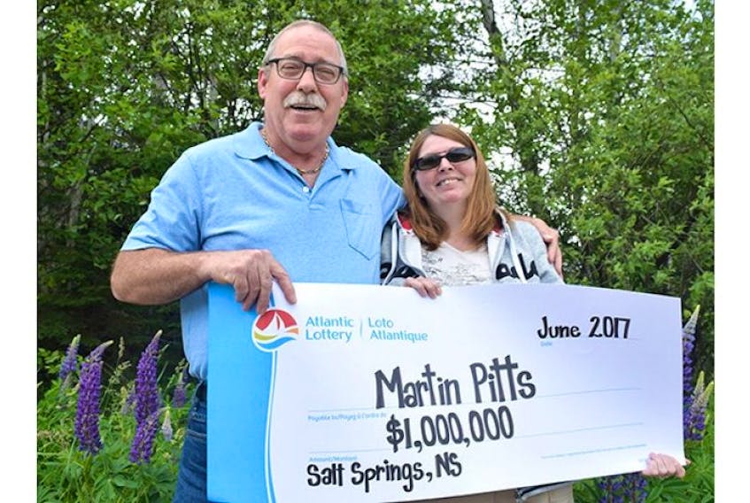 Martin and Jean Pitts celebrate their million-dollar winnings.