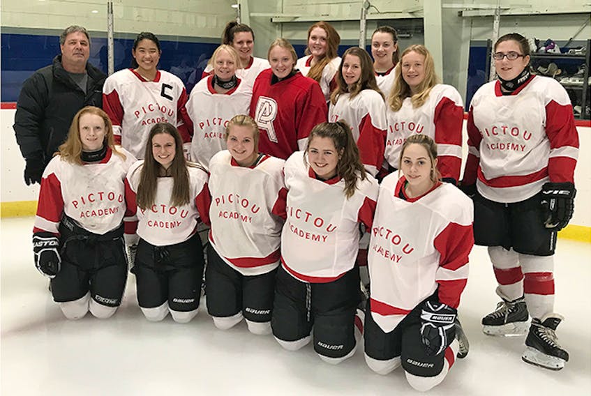 The girls hockey team at Pictou Academy. In front from left are: Thea Waller, Carly Smith, Biancia Bourgeois, Cassie Clarke and MacKenzie Ells. In back from left are: coach Jim Sloan, Marie Arai, Kari Waller, Leigha MacDonald, Hayley Nichol, Jenny Ferrera and Abby Munroe. In back from left are: Emma MacKeil, Charlotte Musick and Jenna Reid. Missing from photo is Megan MacCarthy.