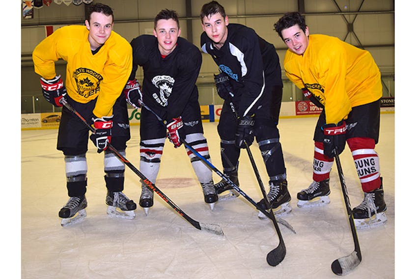 Pictou County Major Bantam Bombers captain Thomas Schnare, second from left, is shown with assistant captains Matthew Carson (far left), Calvin Denny and David Matthews.