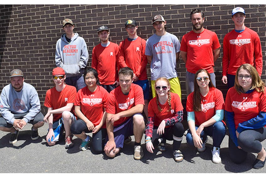 Pictou Academy physical education instructor Adam White, second from right in back, along with some of his Grade 12 students who will do the 5K at the Johnny Miles next Sunday.