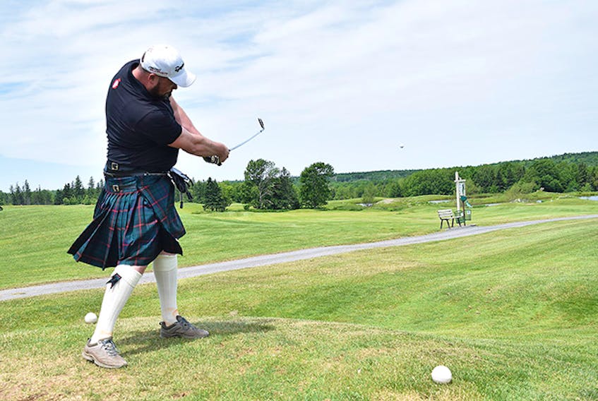 Jeff Davis tees off on the second hole at Glen Lovat Golf Club on Thursday.