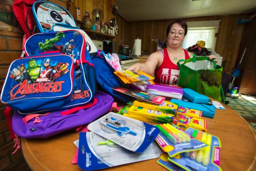 Megan Hartling of Westville collects and bags some of the school supplies she has collected for kids in A.G. Baillie and North Nova Education Centre. This is Meganâs forth year of helping out with school supplies with the help of many friends and donations. (Mark Goudge/SaltWire)