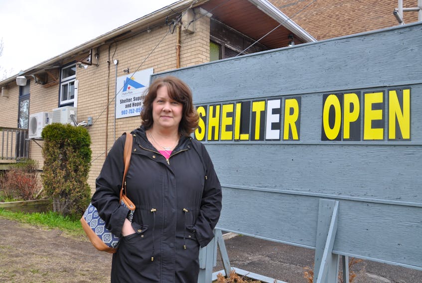 Tammy MacLaren stands outside the Viola's Place society homeless shelter on Donald St, New Glasgow.