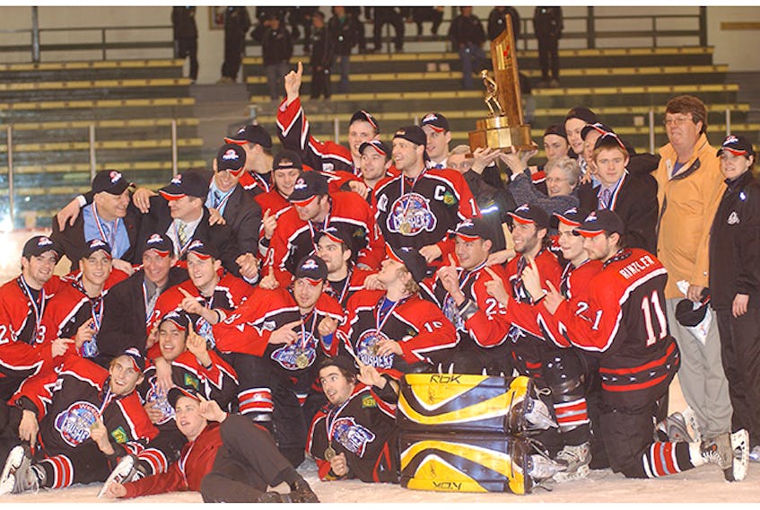 The 2008 Fred Page Cup champions gathered at centre ice at John Brother MacDonald Stadium.