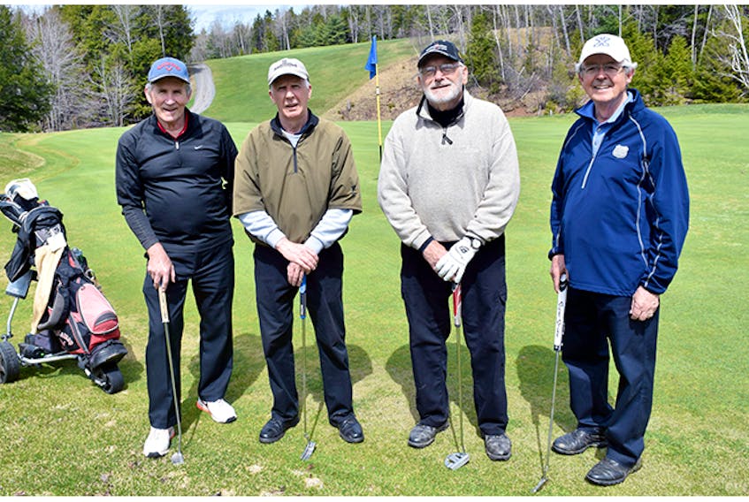 Shown from left are: Harvey Cormier, Grant Dunlop, Clark Savage and Jim MacDonald.