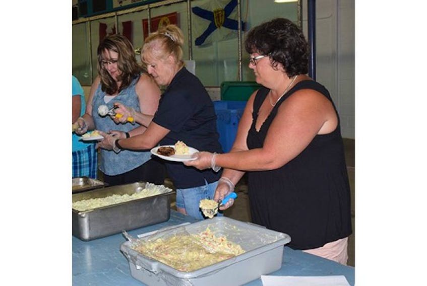 The Kinsmen and Kinette Clubs of New Glasgow hosted a pork chop dinner at last year’s Pictou County Seniors Festival. This year’s festival takes place Aug. 3-5.