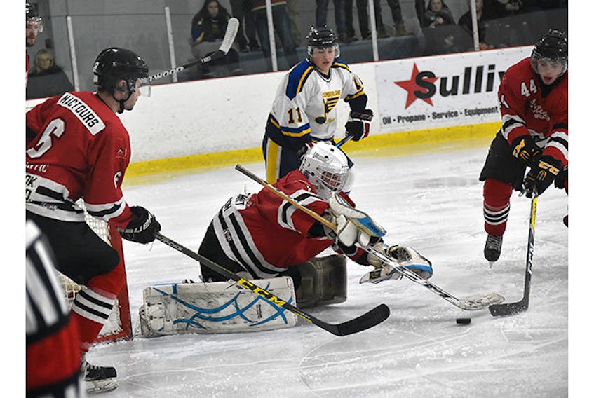 Goaltender Matt Murray defends his crease along with Kirklin Murray and Ian Keating in Pictou County’s 10-1 win over the Cumberland County Blues on Sunday.