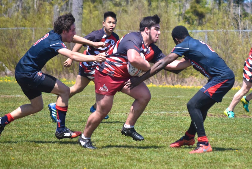 Tyler Matchem of the NRHS Nighthawks carries the ball in a provincial qualifying match against King’s-Edgehill on May 28. The Nighthawks won this game 21-12 to advance to provincials, which will take place this coming weekend in the Annapolis Valley.