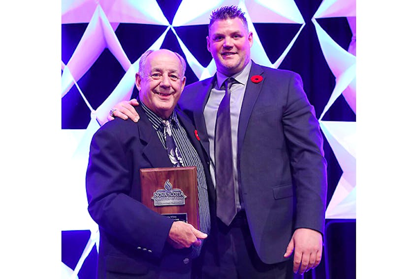 Colin White, shown with Pictou County Sports Hall of Fame curator Barry Trenholm, was inducted into the Nova Scotia Sports Hall of Fame.