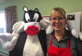 Helen Baudoux poses with Sylvester at the CARMA luncheon at the New Horizons Clubhouse in the Town of Pictou