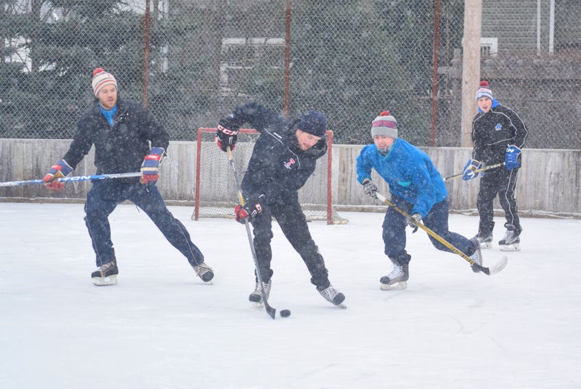 The ice is in at the outdoor rink on New Glasgow’s west side – and reportedly in good condition – as the boys laced them up and played some shinny on Thursday afternoon.