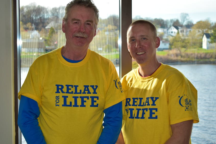 Neil MacKinnon and Shane Hampton of Mac Attack, one of the first teams to participate in the Relay for Life.