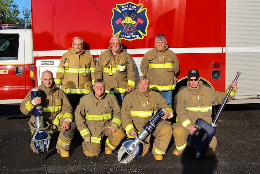 Members of the Caribou Fire Department recently purchased new extraction equipment, which will allow members to get people from vehicles more quickly and efficiently.  Here in front from left are: new fire department members Tommy Campbell, Dorrie Mosel, Sandra Mosel and Brandan Rankin hold the new gear.  They are accompanied by Chief Robert Weaver, back, left; Frank MacFarlane and Robert Langille who are both pump operators with the department.