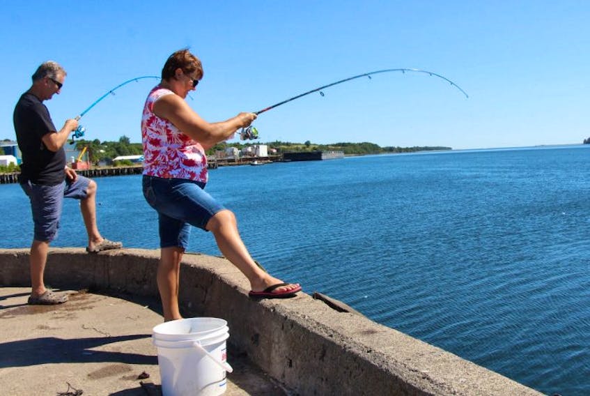 Wayne and Kathy LaPierre of Mount Thom cast their lines into Pictou Harbour in hopes of bringing up some mackerel.