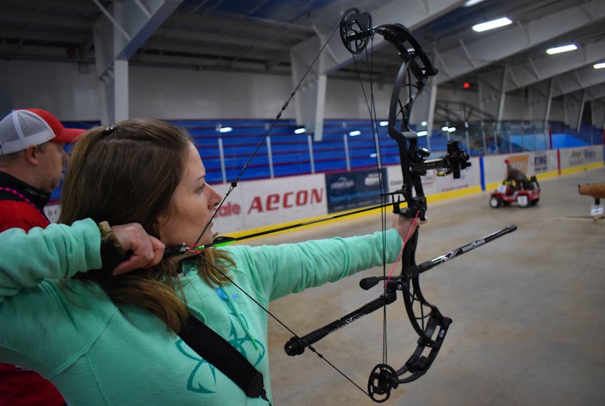 Archer Christa Harpell lines up a shot at the Hector Arena in Pictou on Saturday afternoon.