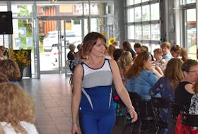 Devon Sonier was one of the many stylish models, showcasing an assortment of spring styles, at the Ahead of Hair and Seaside Treasure Spring Style Fashion Show on Sunday. A portion of the proceeds from the show will be going towards the Pictou Light the Night walk in September.