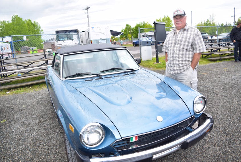 Danny Irving with his 1979 Fiat Spyder.