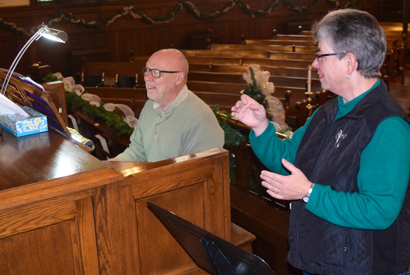 Lloyd MacLean on the organ and conductor Sandra Johnson are looking forward to bringing three church choirs together for a cantata this Sunday at First Presbyterian Church in New Glasgow.