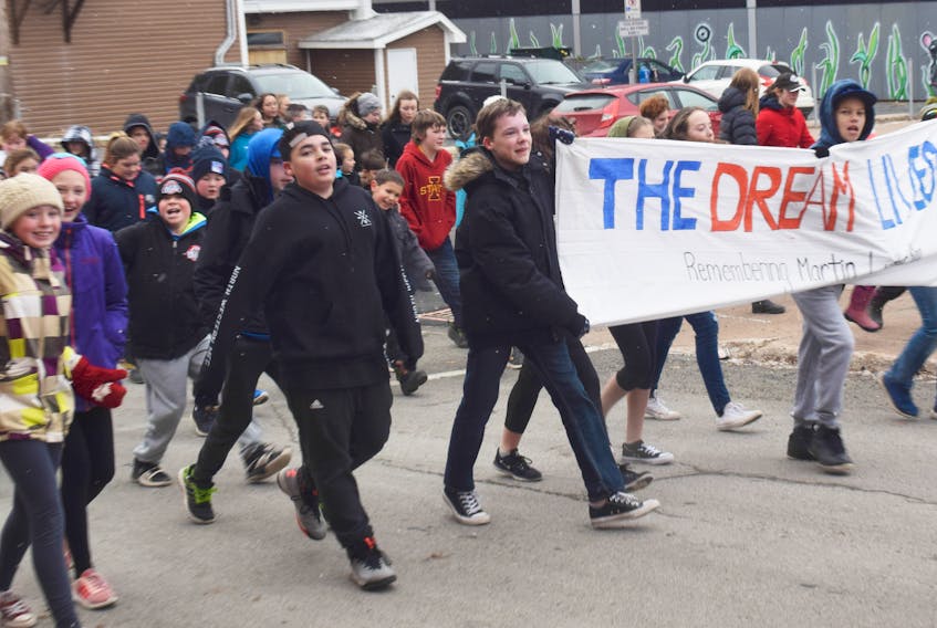 Students from New Glasgow Academy marched from the school to downtown New Glasgow and back as part of activities to remember Martin Luther King Jr.