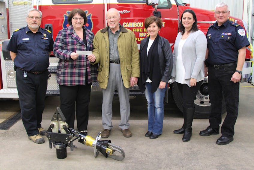 On hand for the presentation are, from the left: Caribou Fire Chief Robert Weaver, Caribou Fire Department treasurer Heather Murphy, SHMF Chair Murray Porter, SHMF vice-chair Dawn Gorman, District Three Coun. Darla MacKeil and Caribou firefighter Steve Tucker.