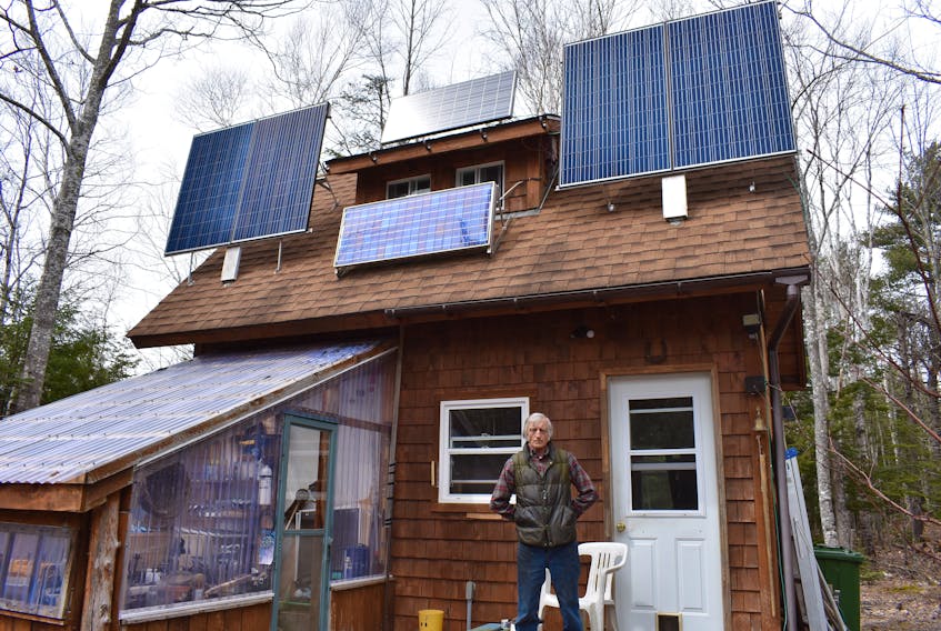 John Patton of West River powers his home with solar panels and lives off the grid.