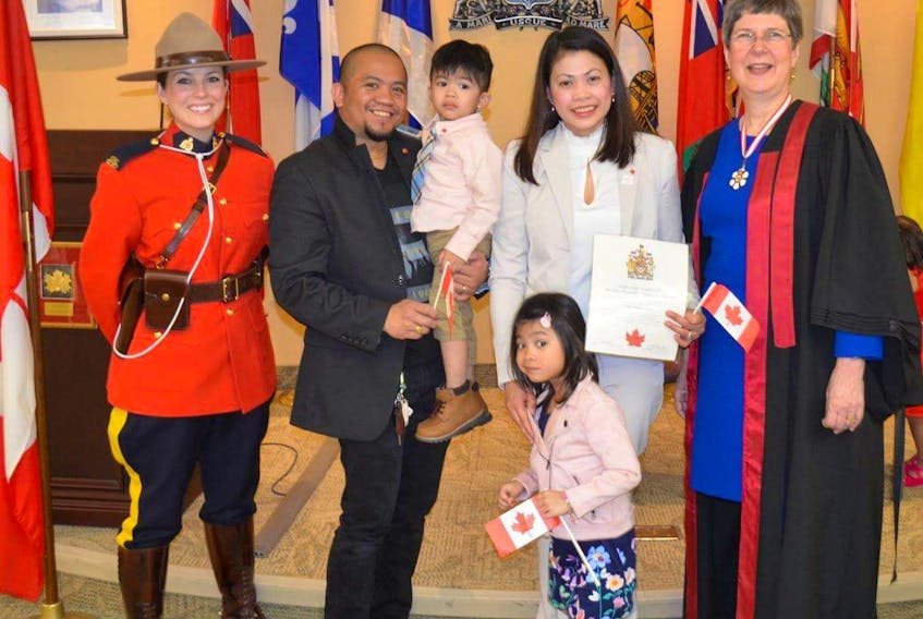 Alma and Jose “Rain” Quetua with their children Gabby and Zander during her citizenship ceremony in Halifax on April 20. They are happy to call Pictou County home.