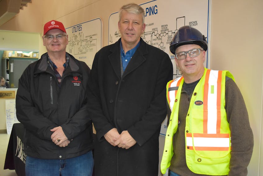 Don MacKenzie, left, president of Local 440 Unifor, and Angus  Pellerin, right, vice president of Local 440,  met with Kings North MLA John Lohr during a tour of Northern Pulp Friday. Lohr toured the plant to show his support to the forestry industry and call on the McNeil government to continue with a Class 1 environmental assessment for a new effluent treatment plant that needs to be built by 2020.
