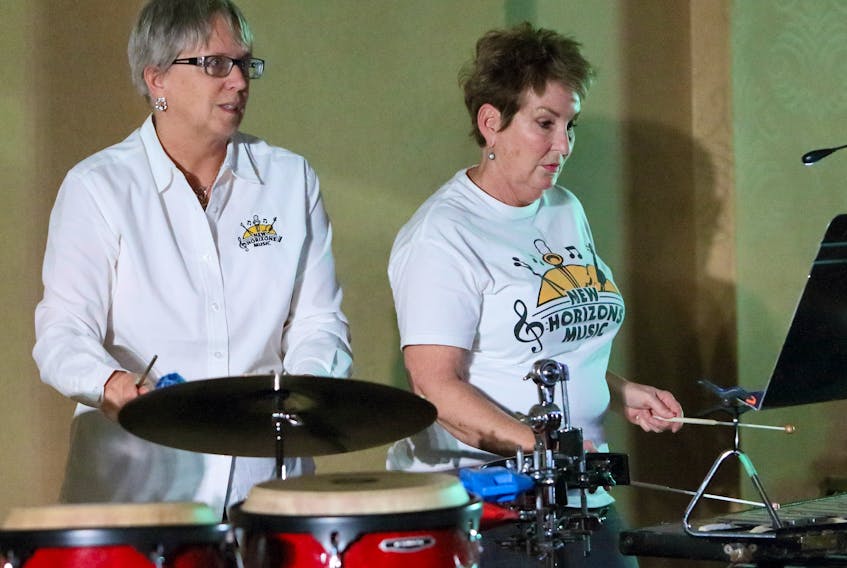 Donna Cooper and Colleen Flemming are both members of New Horizons bands. Cooper plays with the Pictou County band and Flemming with the one in Truro. MARK LEGATE PHOTO