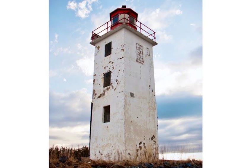 The Caribou Island lighthouse stands as a single structure now that a lower building has been removed. A community group is working with the federal government, coast guard and municipality in hopes of taking over control of it so that it can be made to look more attractive for the public and Caribou Island residents.