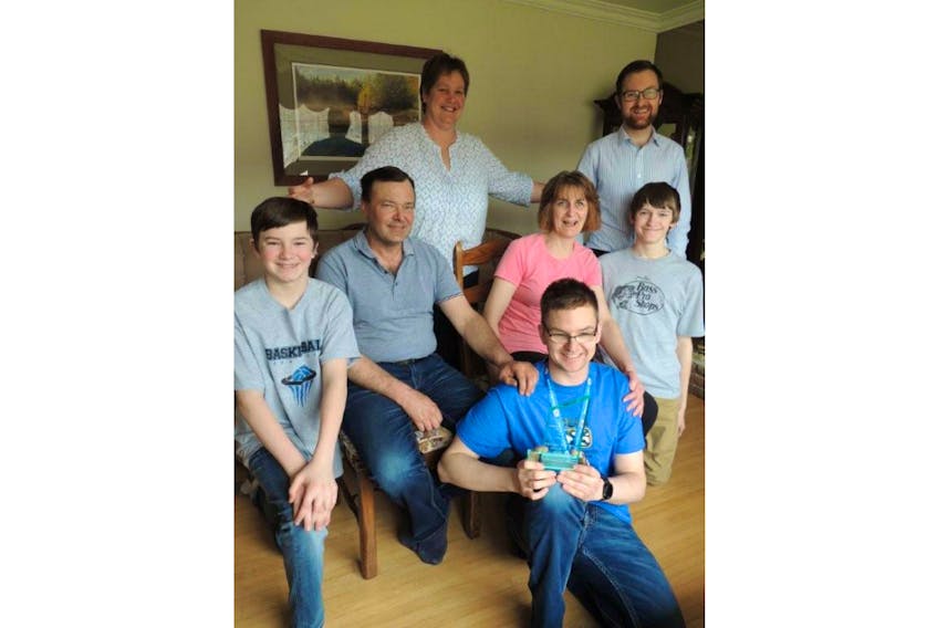 When Nova Scotia chef de mission Cathy Mason goes to the Special Olympics Canada Summer Games in Antigonish this summer, she is taking the whole Sharpe family of Riverton with her. Special Olympics swimmer Evan Sharpe is in the foreground with family members, from left, Dylan, Tracey, Paula, Kalan and Ryan.