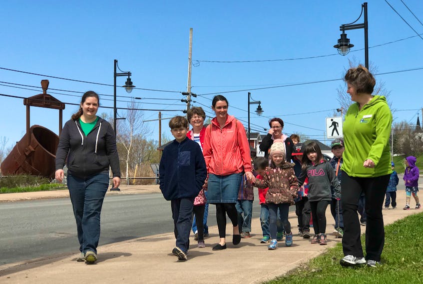 Children take to the streets of Trenton on their way to the park Wednesday for Nova Scotia Walk Day, along with Trenton library staff and book club members