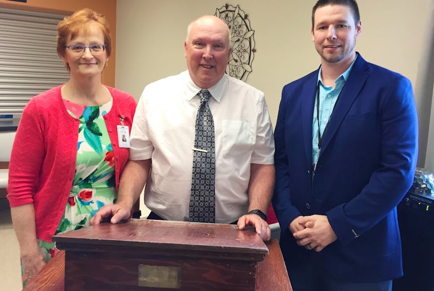 Riverview Home Corporation board of directors chair David Parker, centre, says goodbye to outgoing CEO Patricia Bland and welcomes new CEO Guy Pellerine. Bland retired this month after working in the home’s head administrative role for the past seven years.