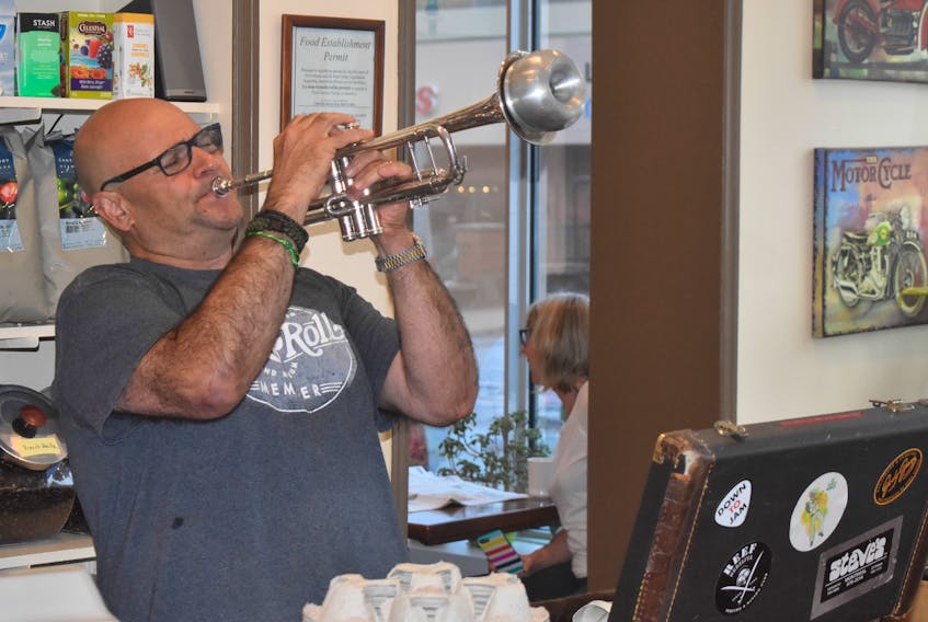 Erez K. treated customers at The Coffee Bean in downtown New Glasgow to some music Thursday morning.