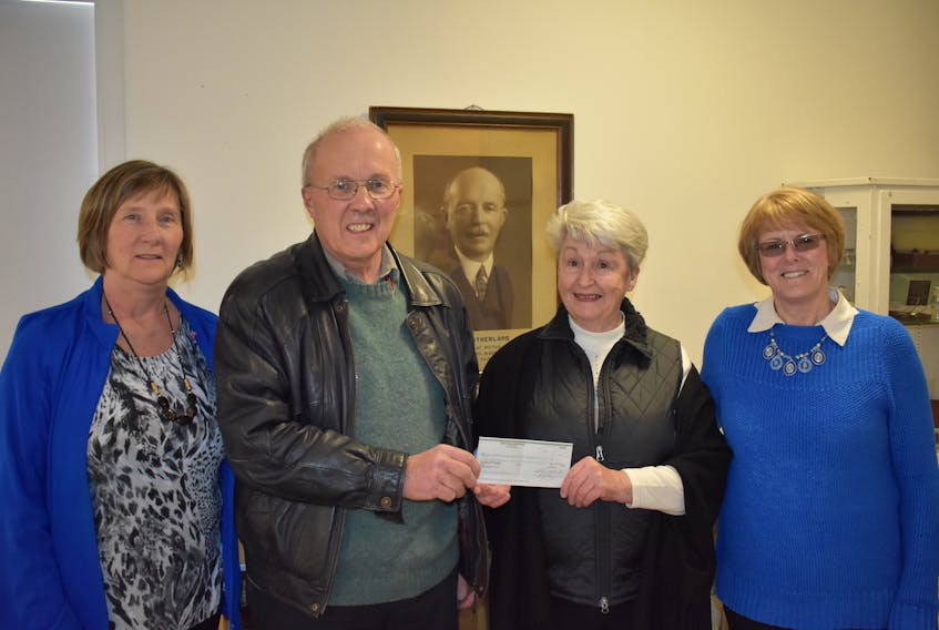 Wanda Theriault, left, Elaine Garland and Cecilia McRae with the Pictou County Mental Illness Family Support Association accept a cheque for $5,000 from Murray Porter, chair of the Sutherland Harris Memorial Hospital Foundation. The money will go toward the Bright Smiles project, providing dental care for people in Pictou County living with mental illness.
