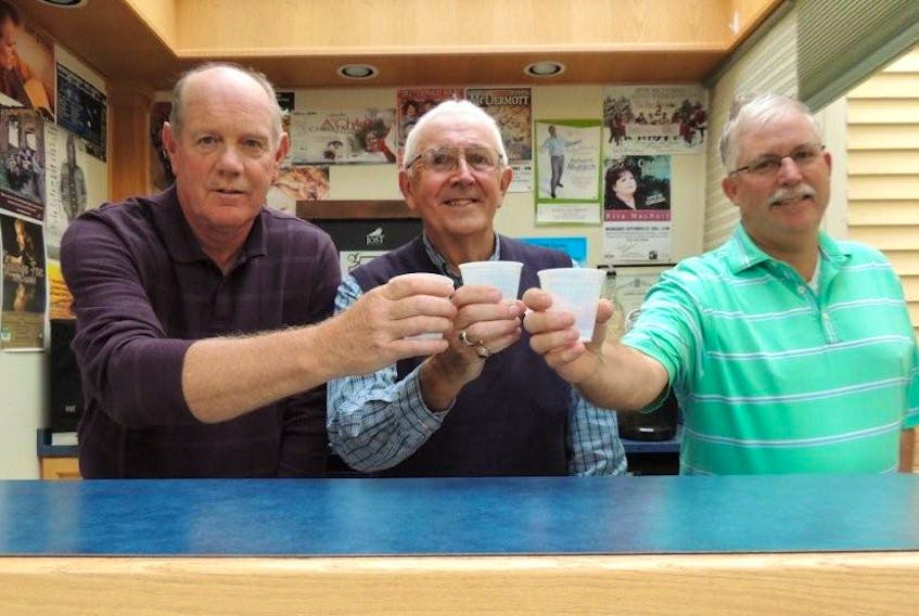 It has been busy for deCoste Centre bartenders with a record number of fall shows but they have no complaints. Dave Munro, Brian Burris and John Thompson raise a toast to entertainment yet to come.