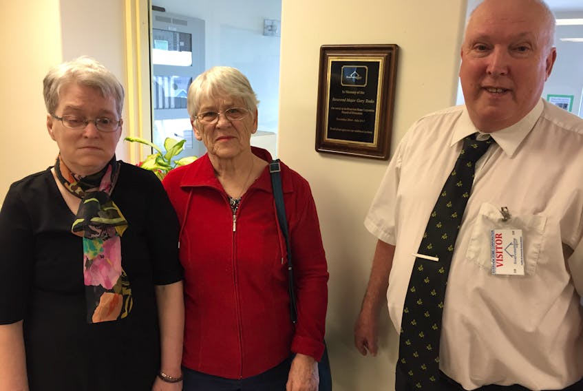 Gary Tonks' daughter Wanda, left, his widow Norma and Coun. David Parker from the Municipality of Pictou County attended a plaque presentation in his honour on Thursday at Riverview.