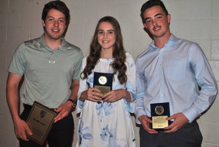 Grade 12 students Zoe Lucas and Matt Murray received the inaugural 88 Award, in memory of Kale Mason, at the North Nova Education Centre non-academic awards on Wednesday night, presented by Mason’s friend Jared Livingstone, left.